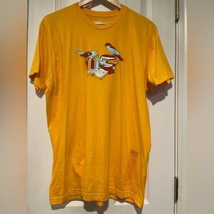Yellow Graphic Uni-Sex T-Shirt with Bird & Books Design